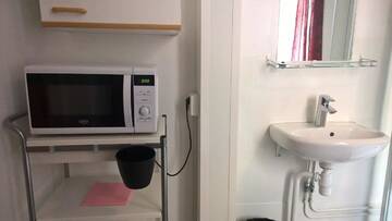 Фото номера Двухместный номер с 2 отдельными кроватями и душем Гостевой дом Brahe Ensuite г. Турку 3