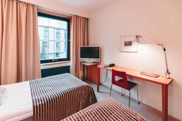 Фото номера Двухместный номер с 2 отдельными кроватями Отель Centro Hotel Turku г. Турку 10